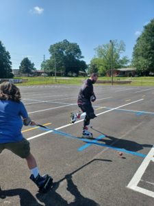 Dad shows off fancy footwork to Son